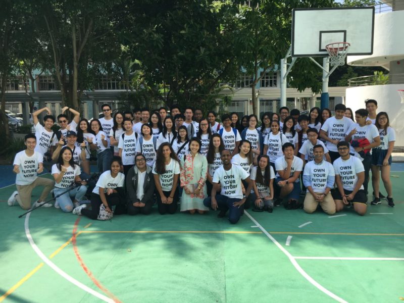 Natalie Chan, Founder of OWN Academy, surrounded by student volunteers at the OWN Future Fair